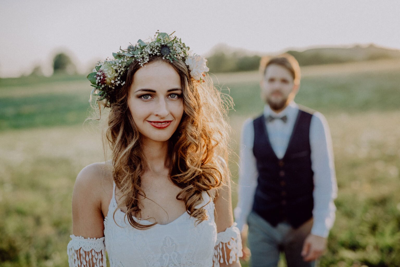 beautiful-bride-and-groom-at-sunset-in-green-natur-PG3HH65-gallery.jpg